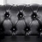 Fauteuil d'appoint capitonné en similicuir noir avec clous de tapissier pour 1 personne