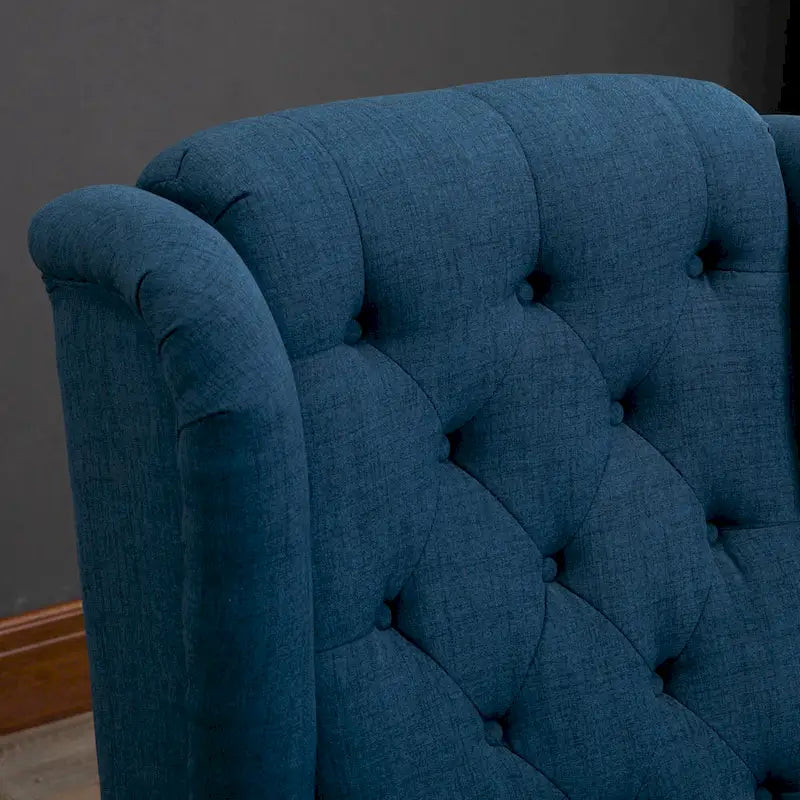 Fauteuil d'appoint bleu en tissu à haut dossier et capitons pour 1 personne