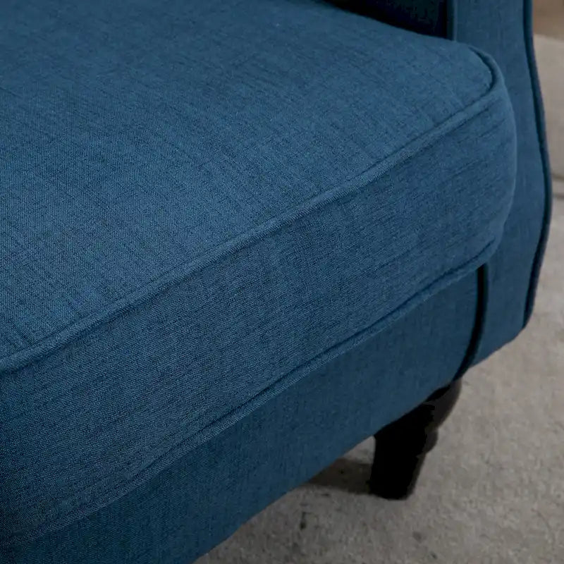 Fauteuil d'appoint bleu en tissu à haut dossier et capitons pour 1 personne