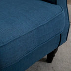 Fauteuil d'appoint bleu en tissu à haut dossier et capitons pour 1 personne