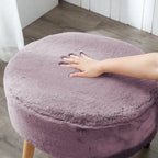 Ottoman ovale multicolore en fausse fourrure avec pieds en bois pour 1 personne