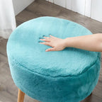 Ottoman ovale multicolore en fausse fourrure avec pieds en bois pour 1 personne