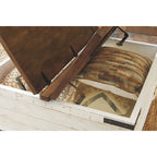 Table basse Wystfield d'Ashley Signature Design, en pin vieilli ivoire et brun