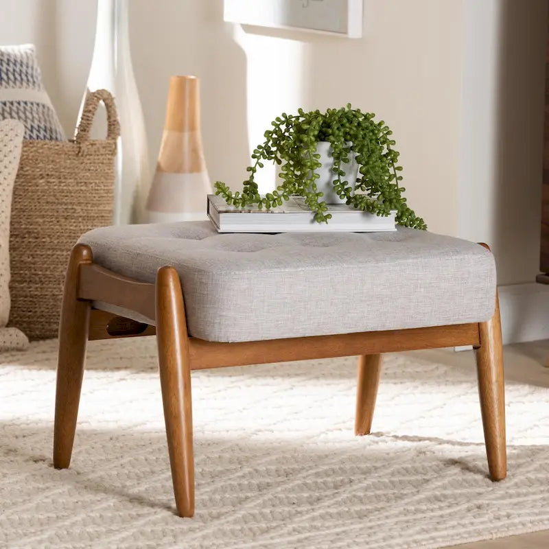 Pouffe ottoman Japandi en tissu gris foncé/beige capitonné avec pieds en noyer
